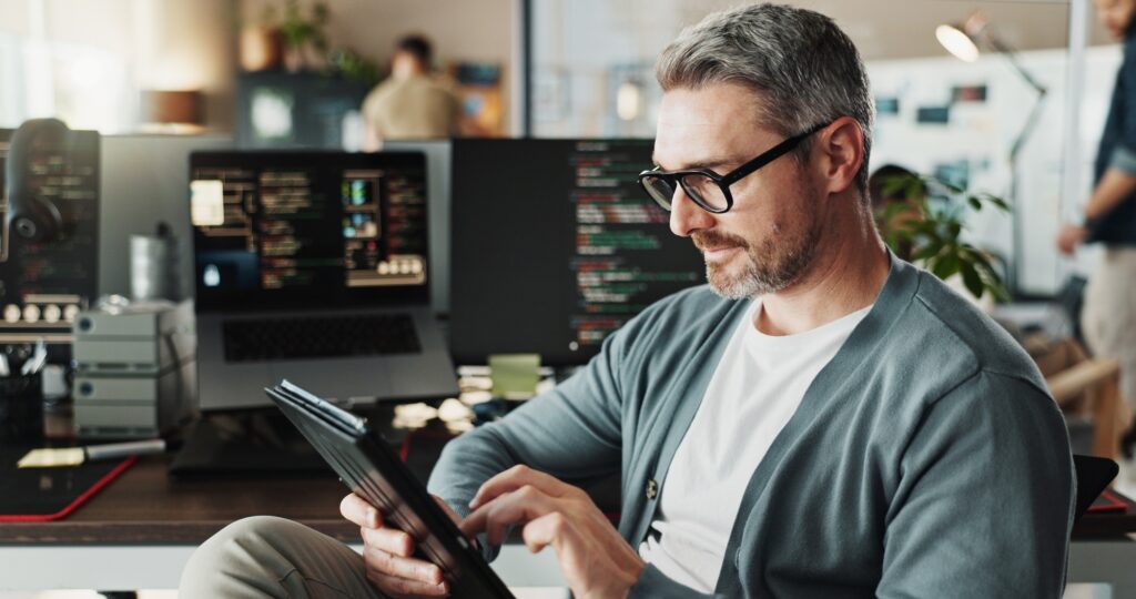 Engineer, business man and code on tablet for software development, scroll or online update. Progra